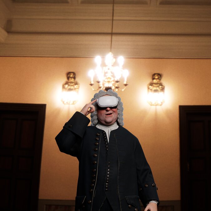 Historically staged concert hall with baroque architecture, chandeliers, and classical attire. | © Bach-Archiv Leipzig | OVRLAB